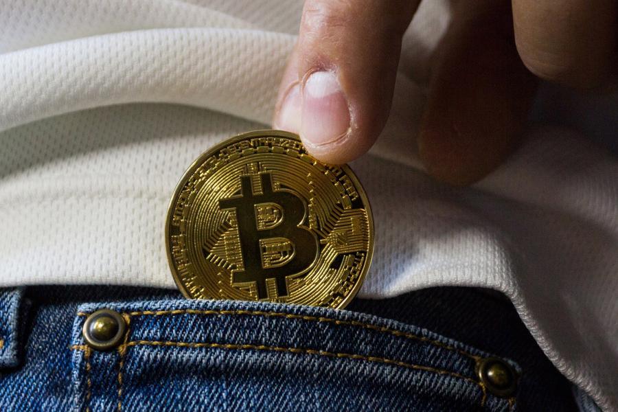Anxious bitcoin speculators have sought refuge in gold amid a price plunge in the cryptocurrency.